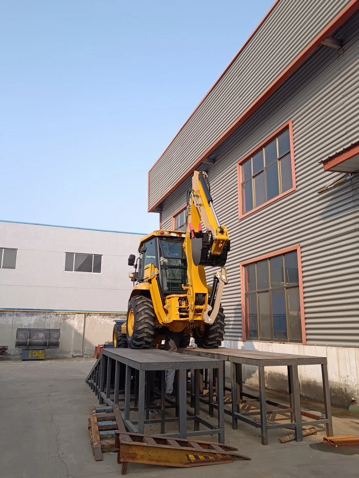Standard 3CX backhoe loader in material yard
